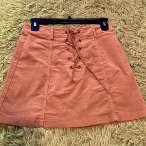 Brown suede skirt with cross tie in the front